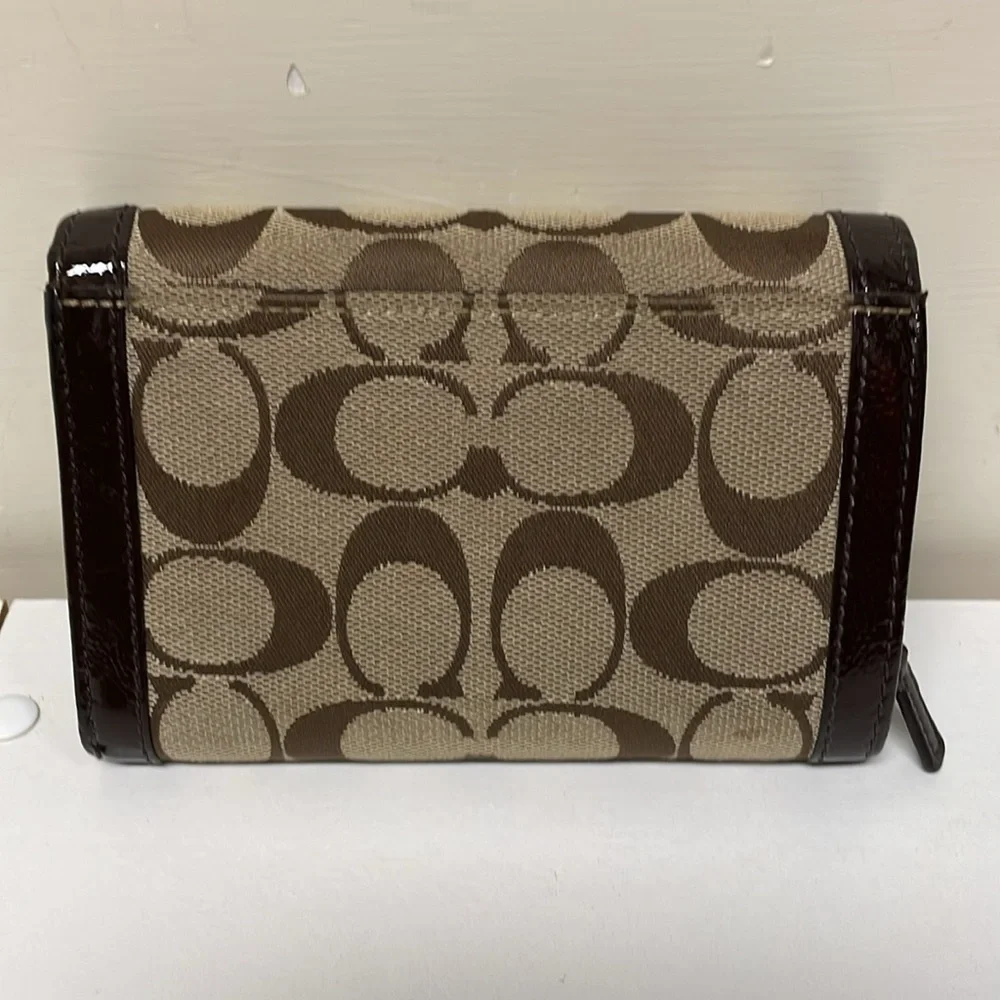Coach Brown Signature Canvas and Leather Buckle Flap Compact Wallet